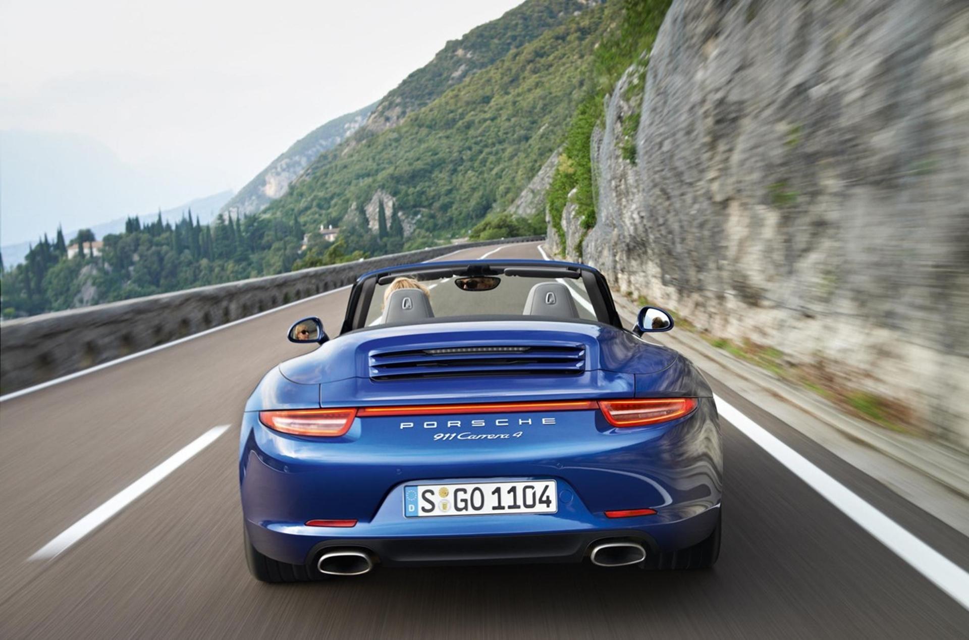NEW ALL-WHEEL DRIVE PORSCHE 911 MODELS INCREASE PERFORMANCE BY THE POWER OF FOUR