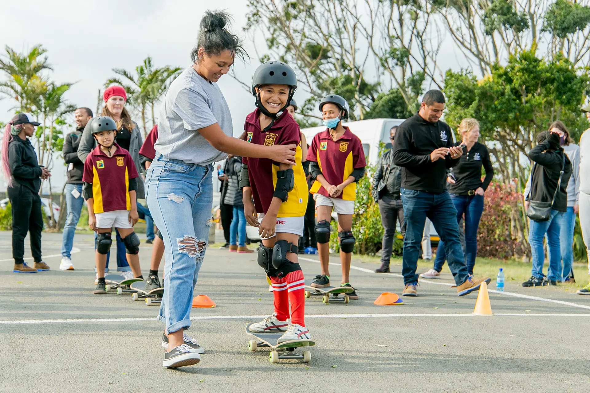 Skateistan Coaches Teaching A.w Barnes Learners To Skate