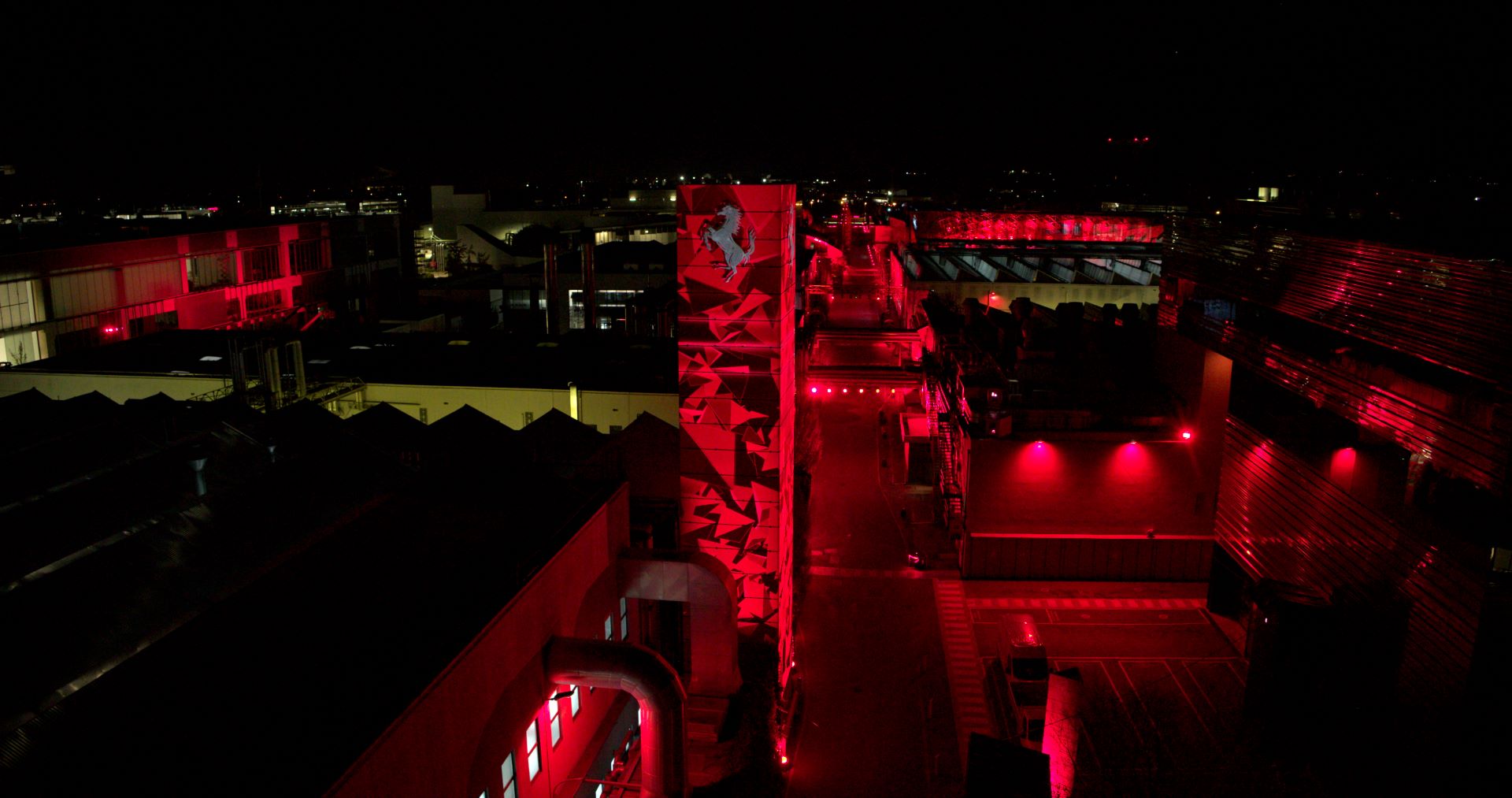 A light show dedicated to ferrari people illuminates the maranello factory