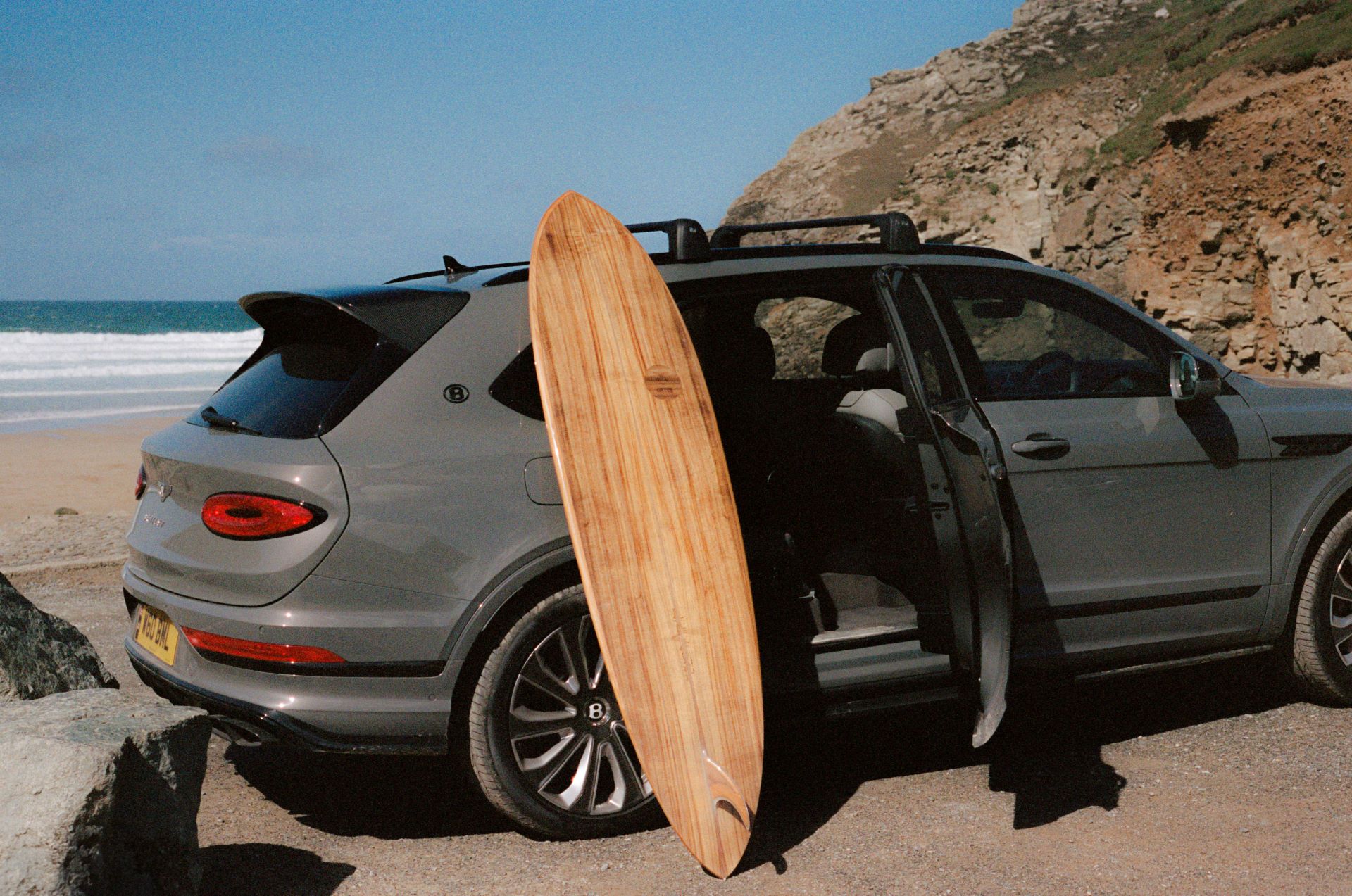 Bentley Motors Unveils One Of A Kind Koa Veneer Surfboard In Collaboration With Marnie Rays And Otter Surfboards
